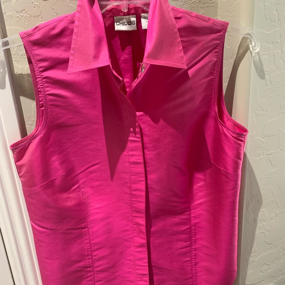 Chico’s pink sleeveless silk blouse. Perfect for layering.